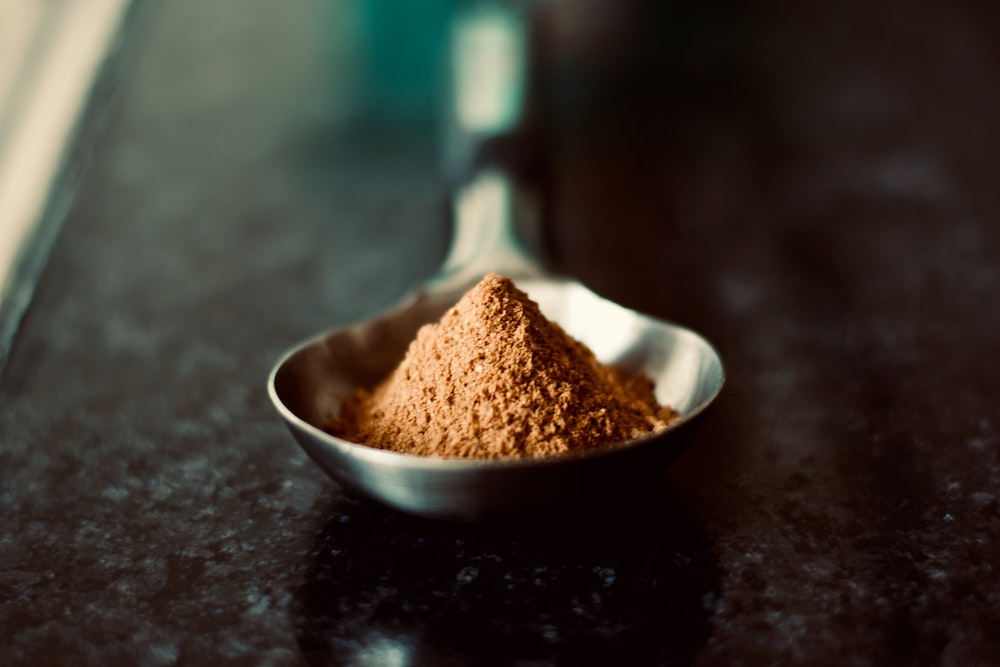Protein Powder flavour in a Spoon - Photo by Indivar Kaushik on Unsplash 